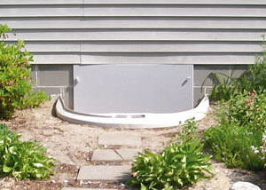 Rigid plastic crawl space access well installed in a Rye crawl space