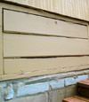 an old-fashioned crawl space door in Cortlandt Manor about to be replaced