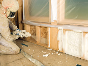 Insulation being applied to a Scarsdale home