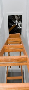 A drop-down stair leading to an attic