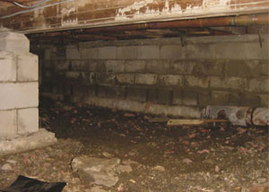 Rotting, decaying crawl space wood damaged over time in Pound Ridge