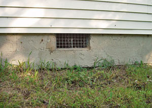 Open crawl space vents that let rodents, termites, and other pests in a home in Hopewell Junction