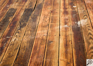A Schenectady wood floor displaying water damage.